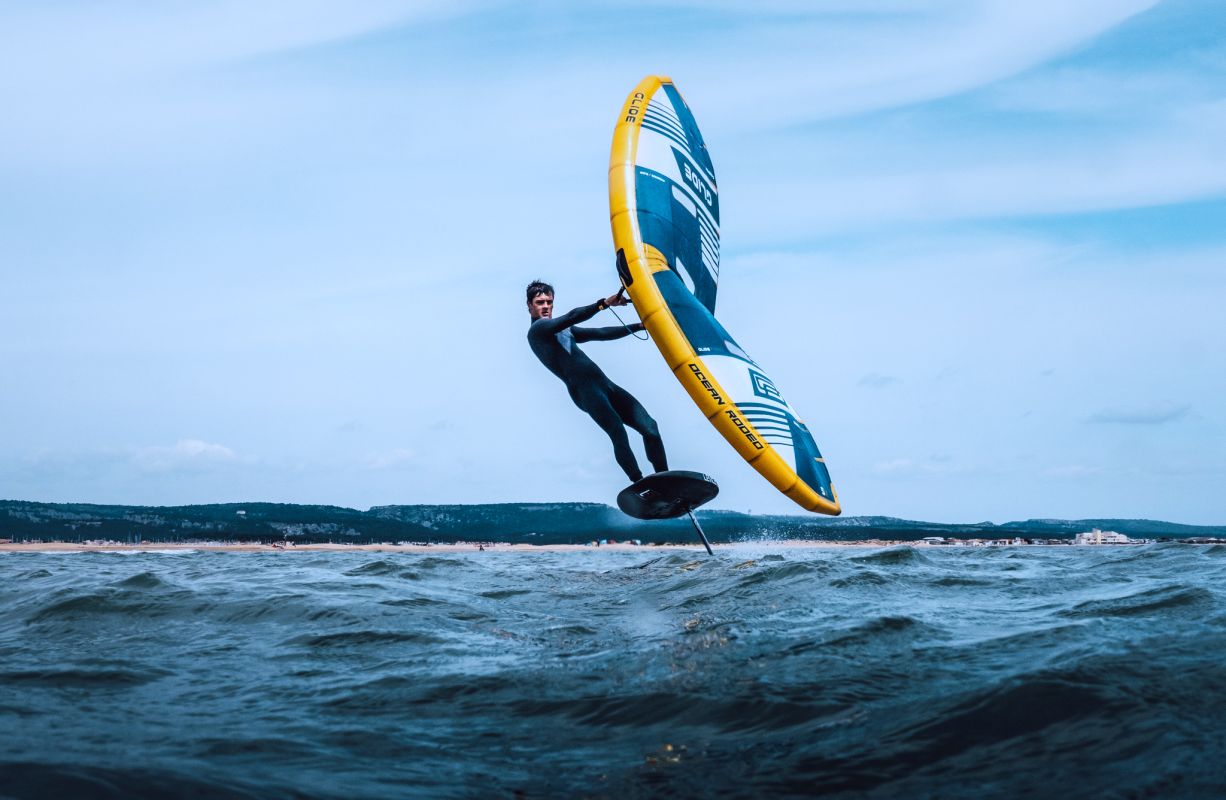 Mathis Ghio wingfoiling on the water using Ocean Rodeo kit