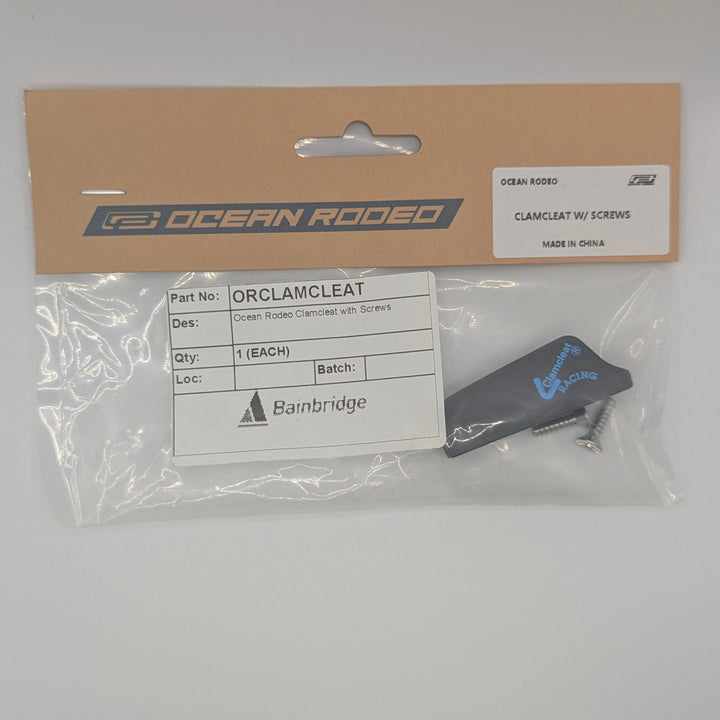 Packaged Ocean Rodeo clamcleat with clear plastic cover on gray background